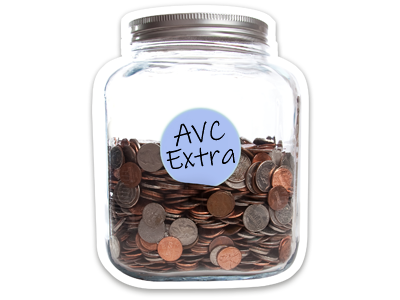 A glass jar, holding a large amount of coins. The jar is labelled AVC Extra