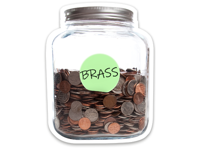 A glass BRASS jar, holding a large amount of coins